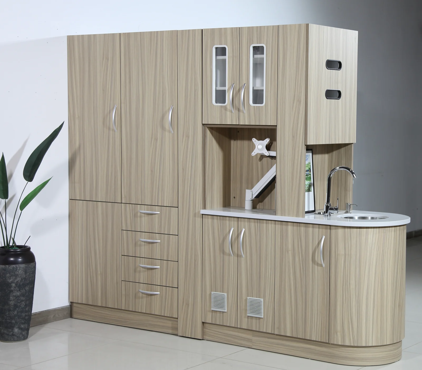 TJ-DC20 cabinet with wood grain finish in a factory or showroom