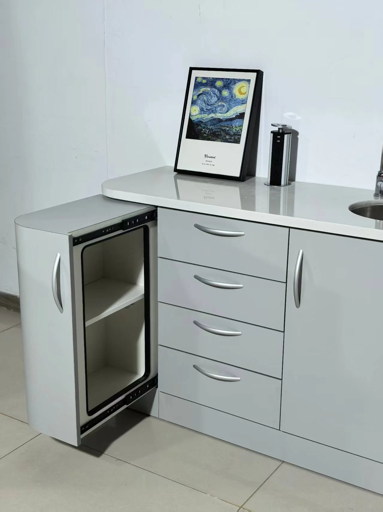 TJ-DC26B gray cabinet with an open storage compartment and four drawers