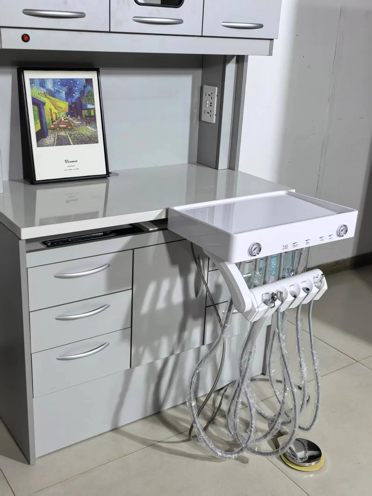 TJ-DC600 cabinet with delivery unit in a factory or showroom setting